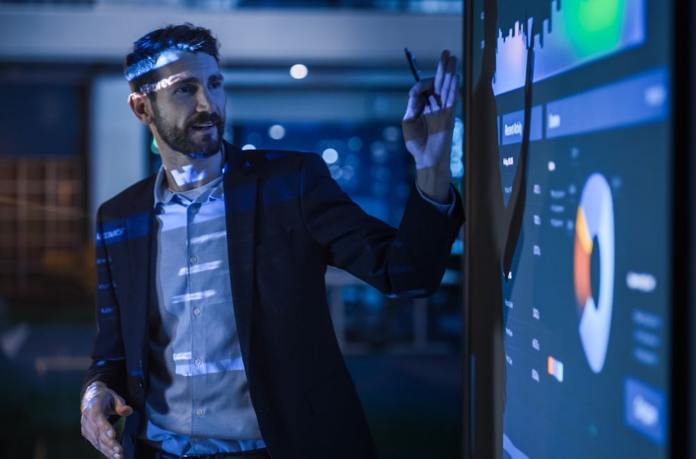 Close up of a man presenting stats